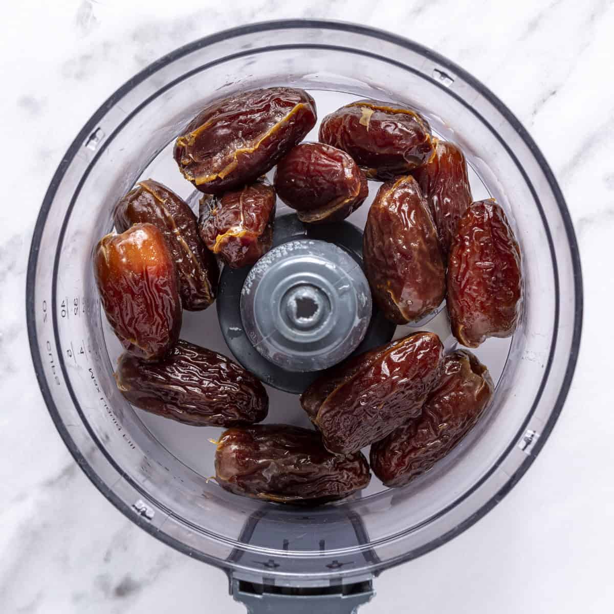 Soaked dates in a food processor.