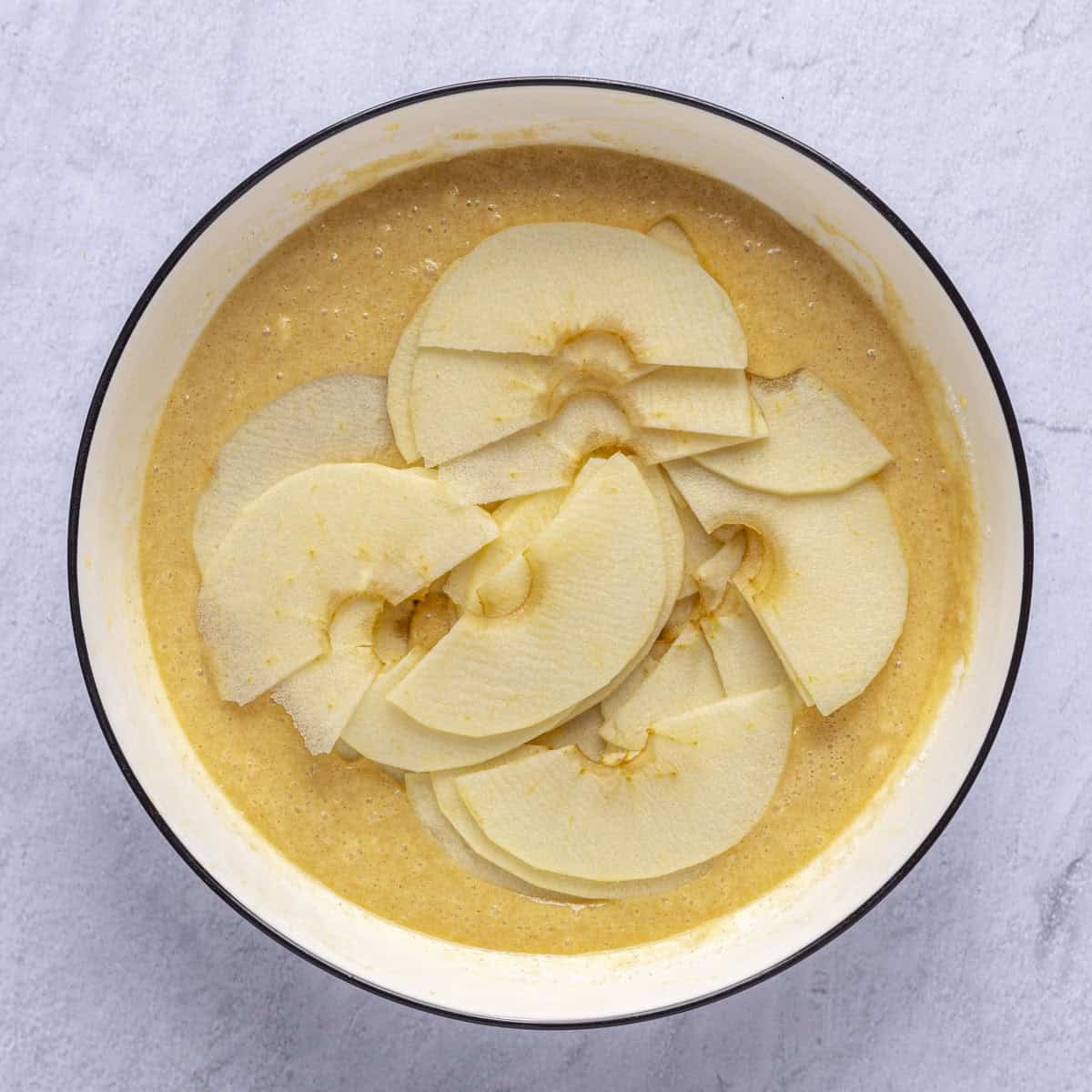 After mixing the batter with apple slices added on top.