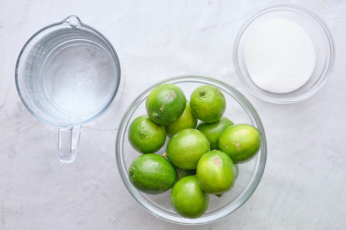 Ingredients for recipe: water, sugar, and fresh limes.