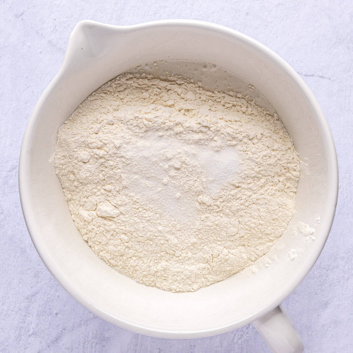 Dry ingredients added on top of yeast mixture.
