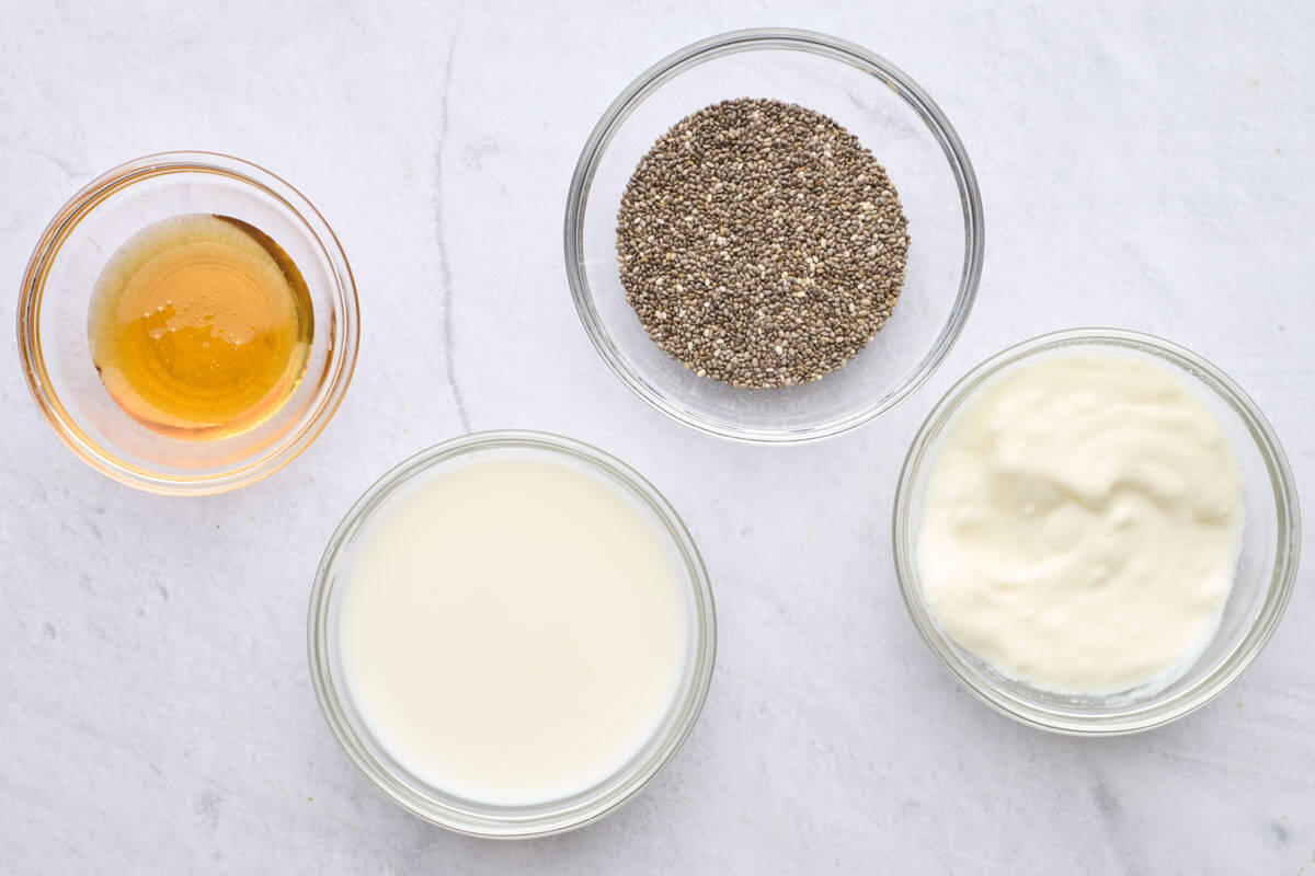 Ingredients for recipe: honey, milk, yogurt, and chia seeds.