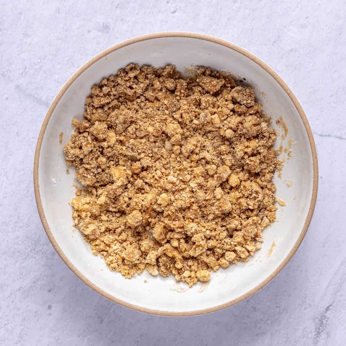 After combining topping ingredients until crumbly.