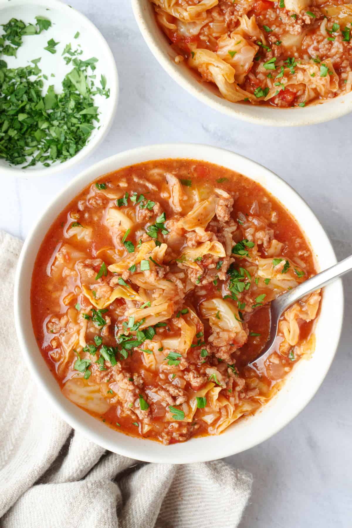 Homemade cabbage roll soup made with ground beef, rice and cabbage in a tomato broth.