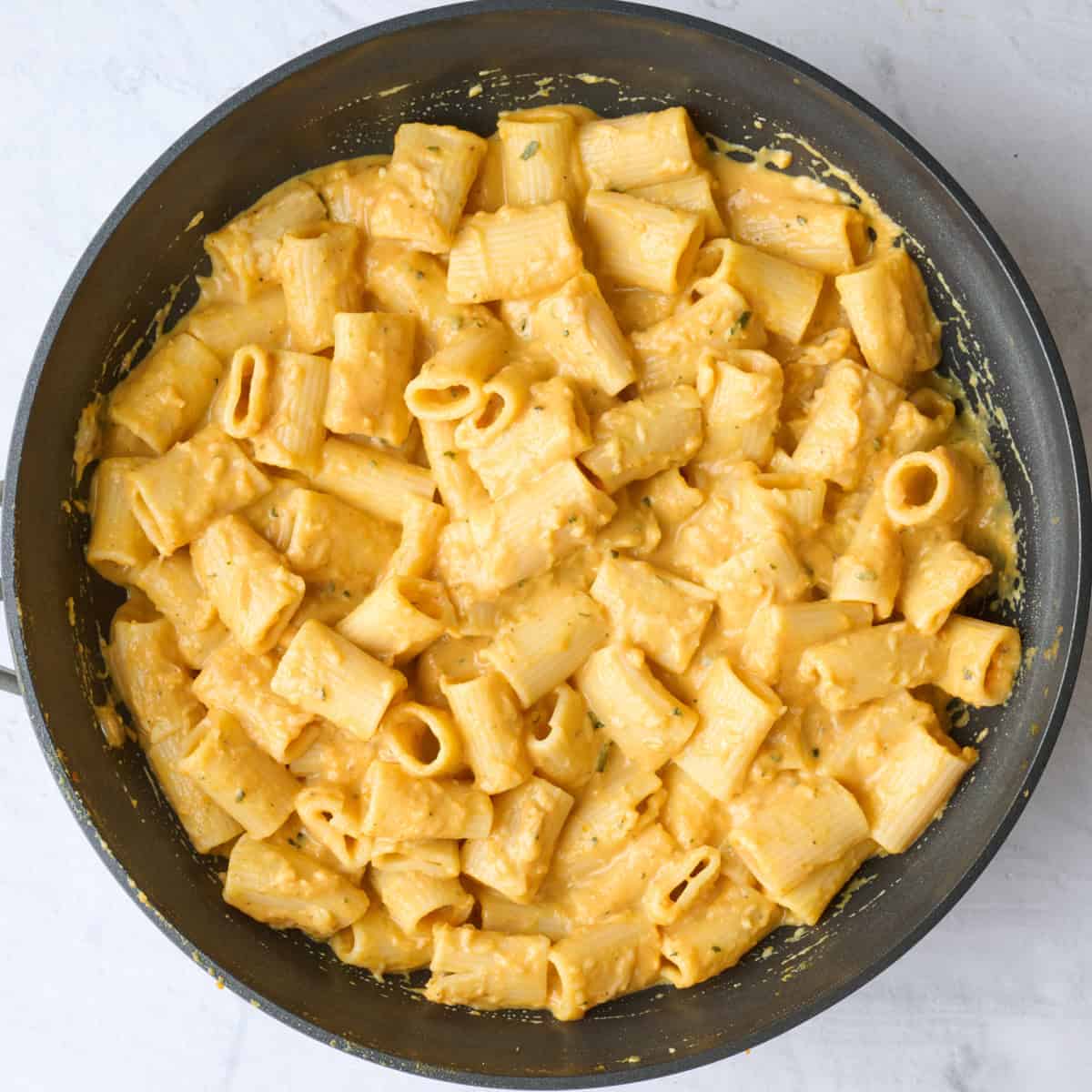After tossing pasta, sauce, and cheese.