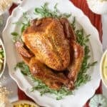 Dry brined turkey recipe on a platter.