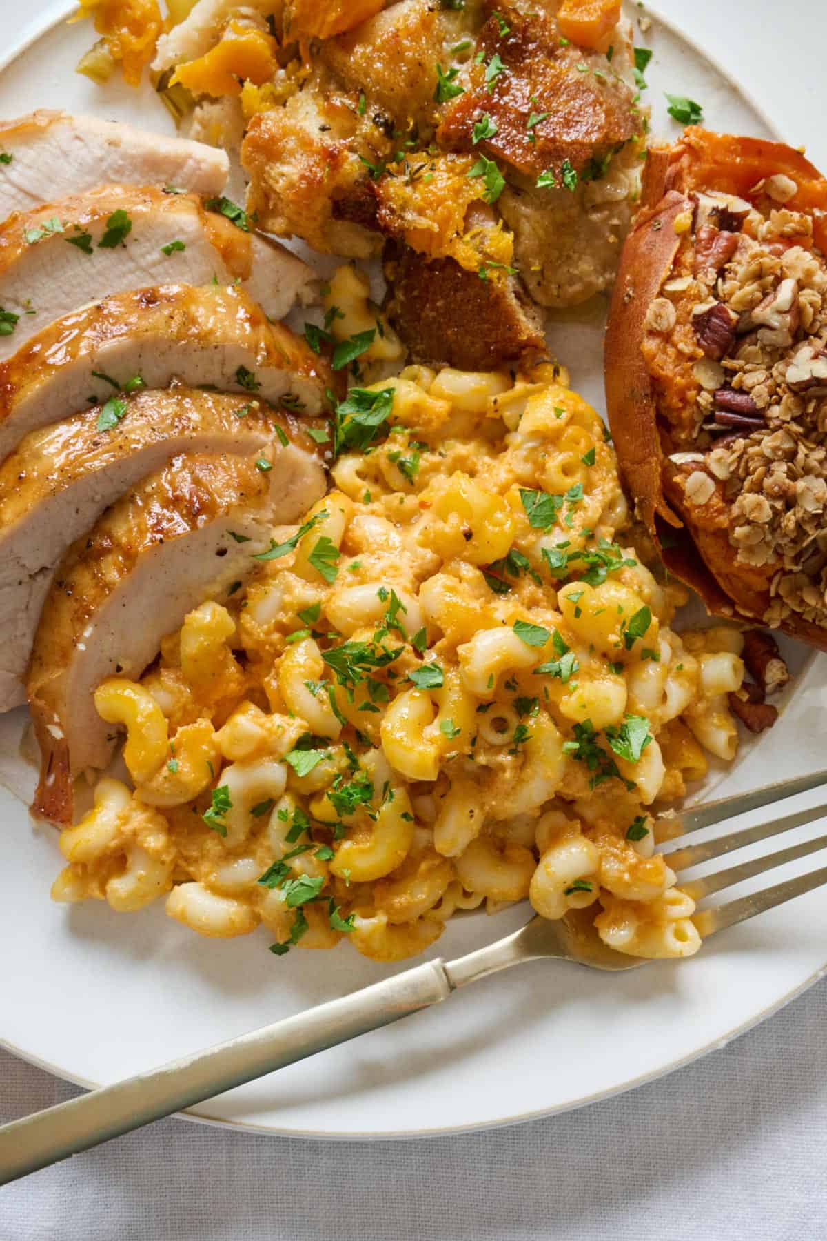 Easy pumpkin mac and cheese recipe on dinner plate.