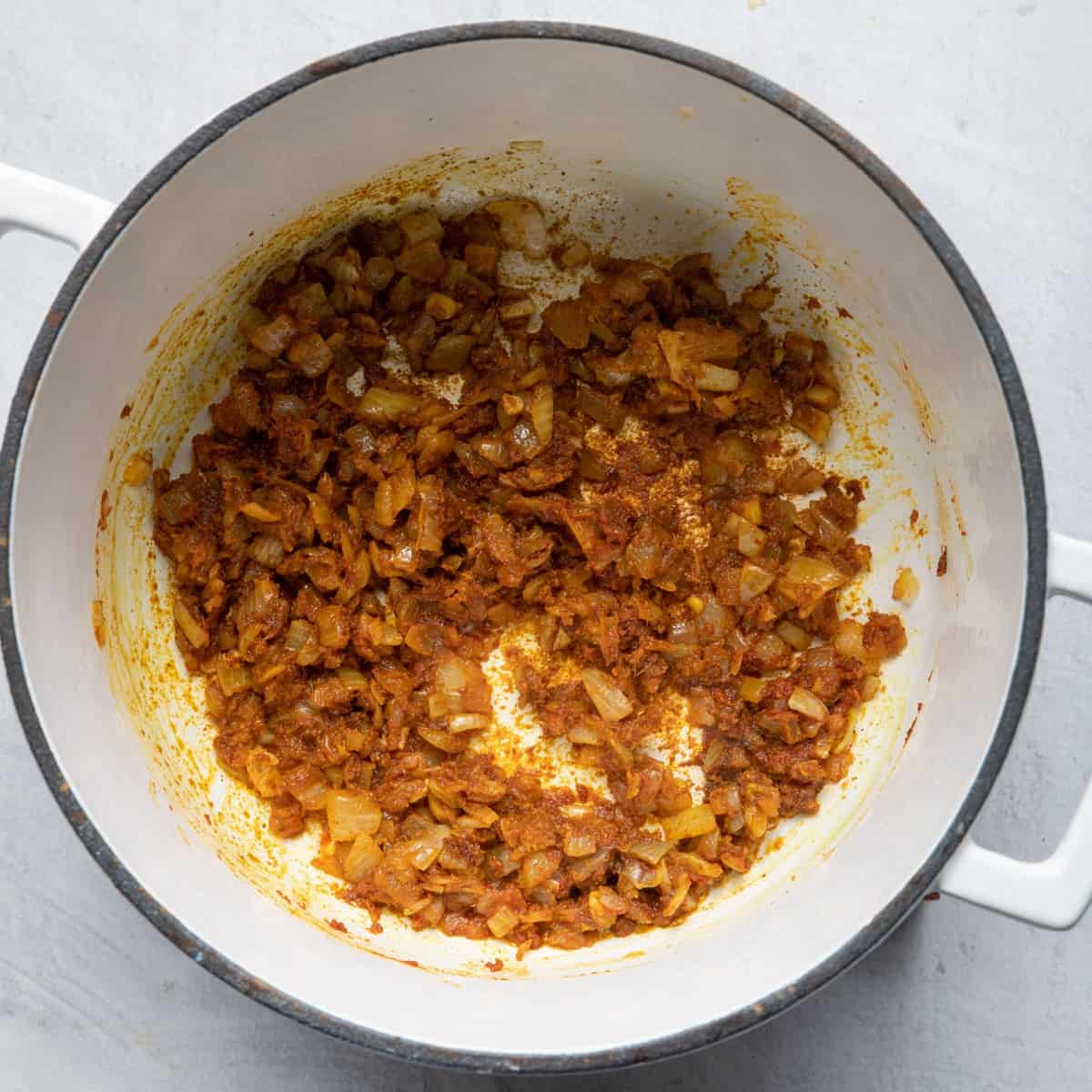 Spices and onions cooked together.