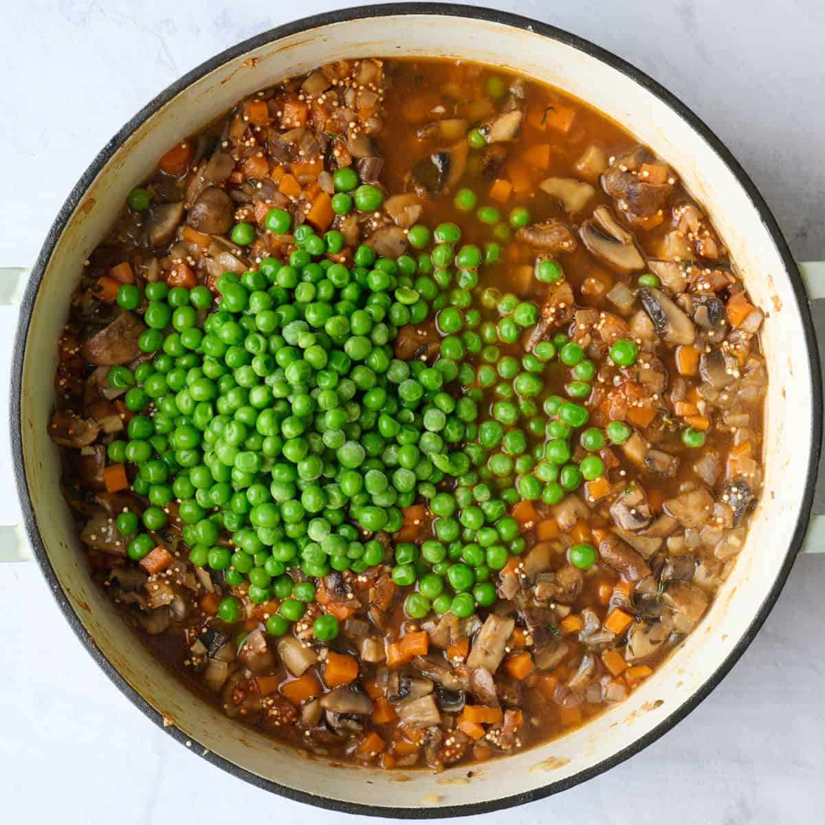 Peas added to pot.