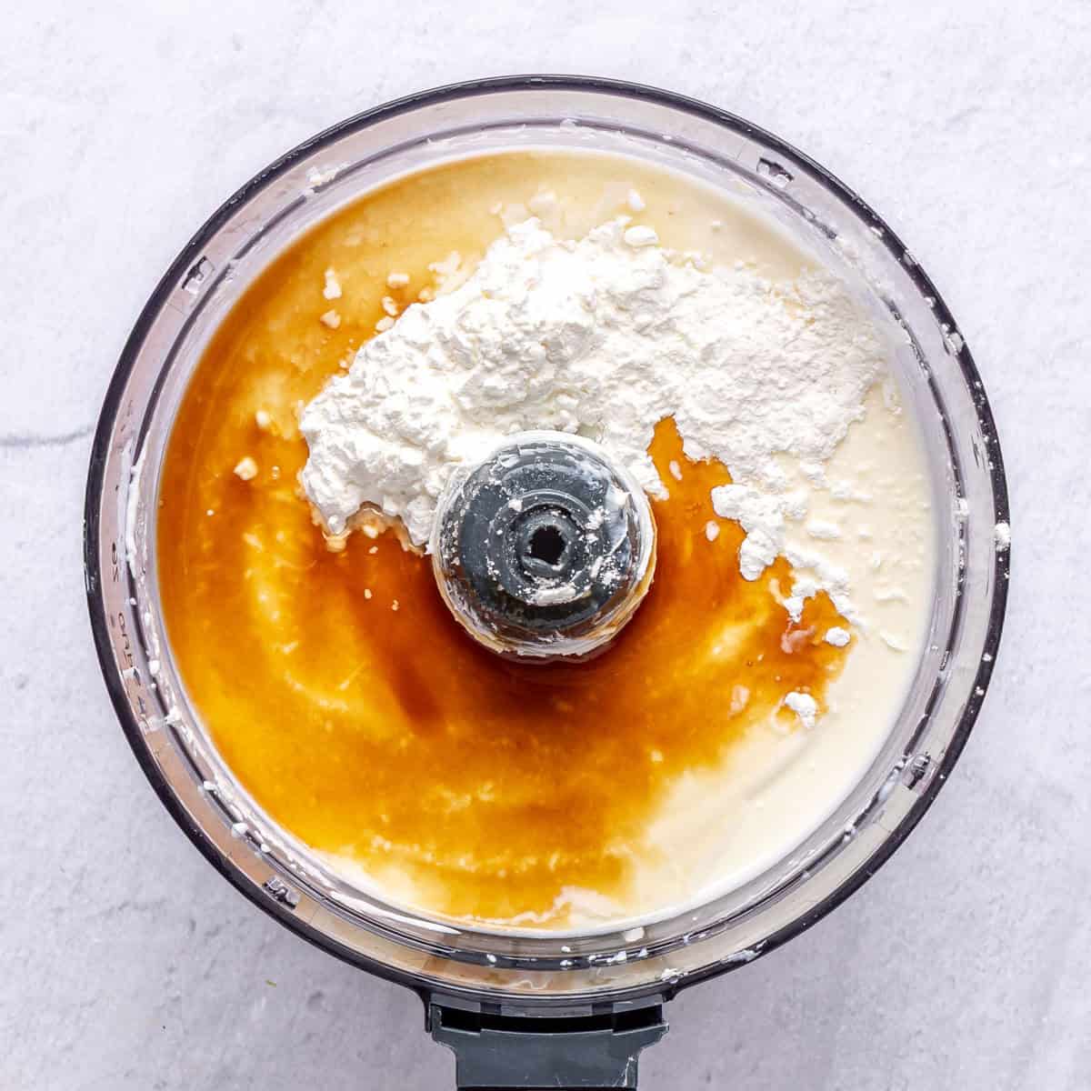 Cottage cheese and cream cheese after processing until smooth and creamy with cornstarch, vanilla and lemon juice added before mixing into cheesecake batter.