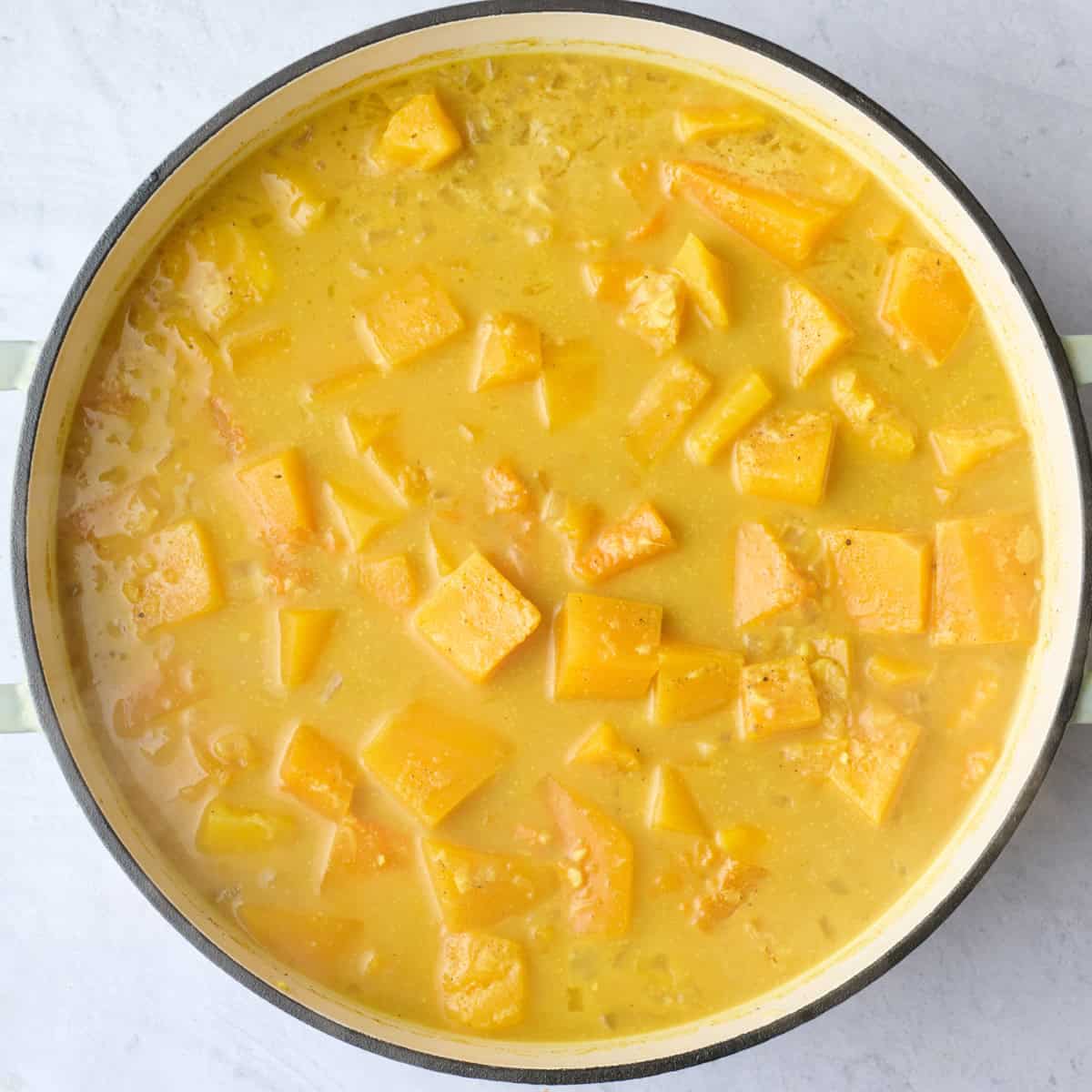 Butternut squash soup with curry powder after cooking.