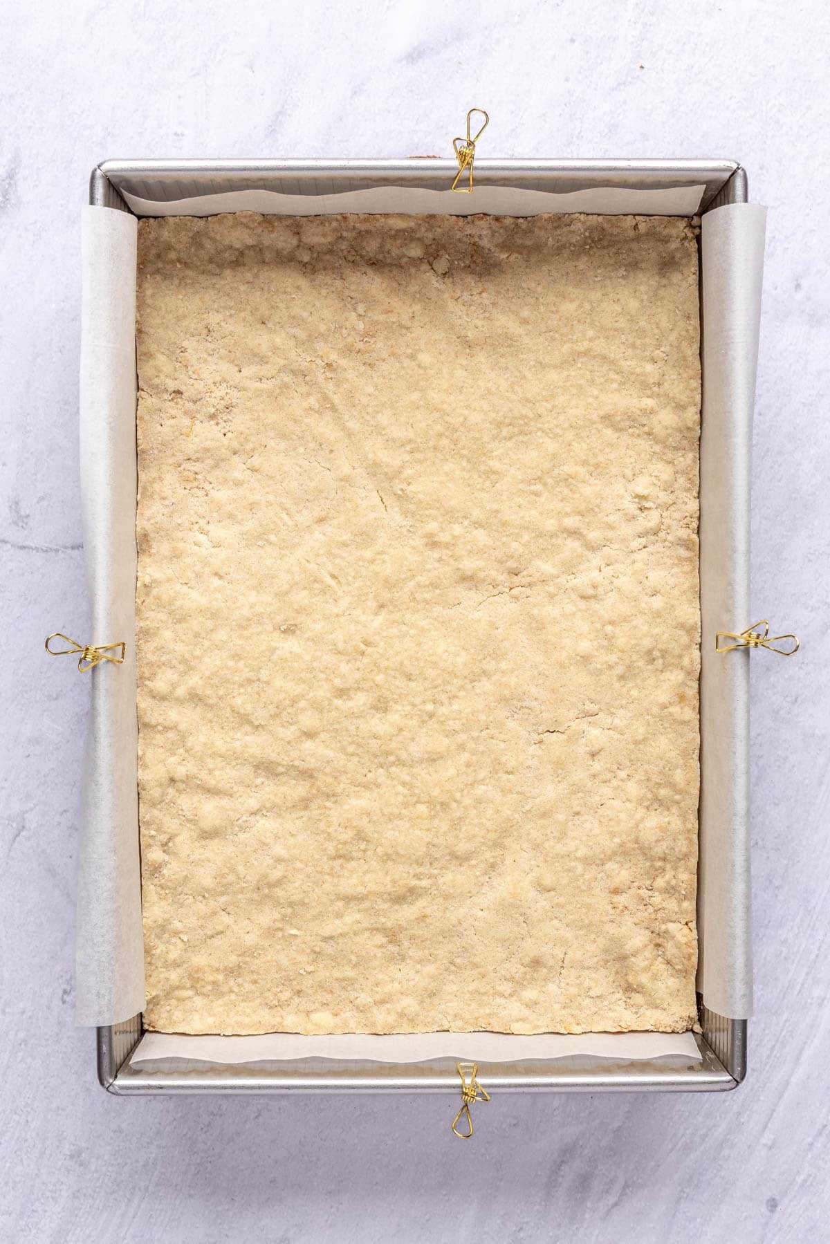 Pecan bar crust after baking.