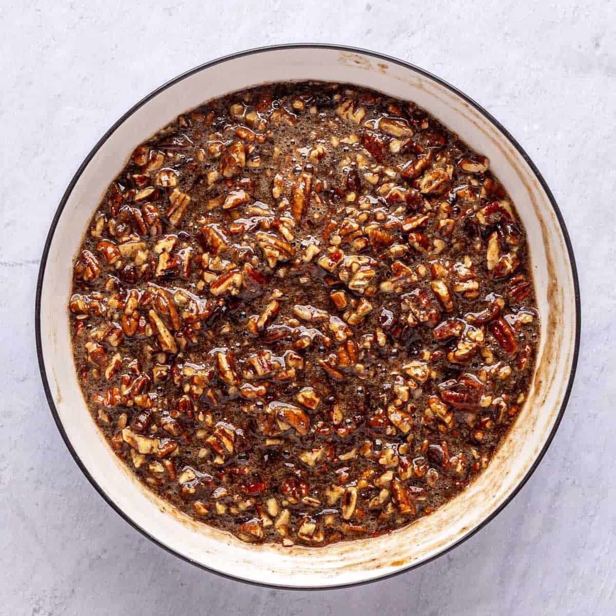 Pecan pie bar filling made with dates instead of corn syrup in a bowl.