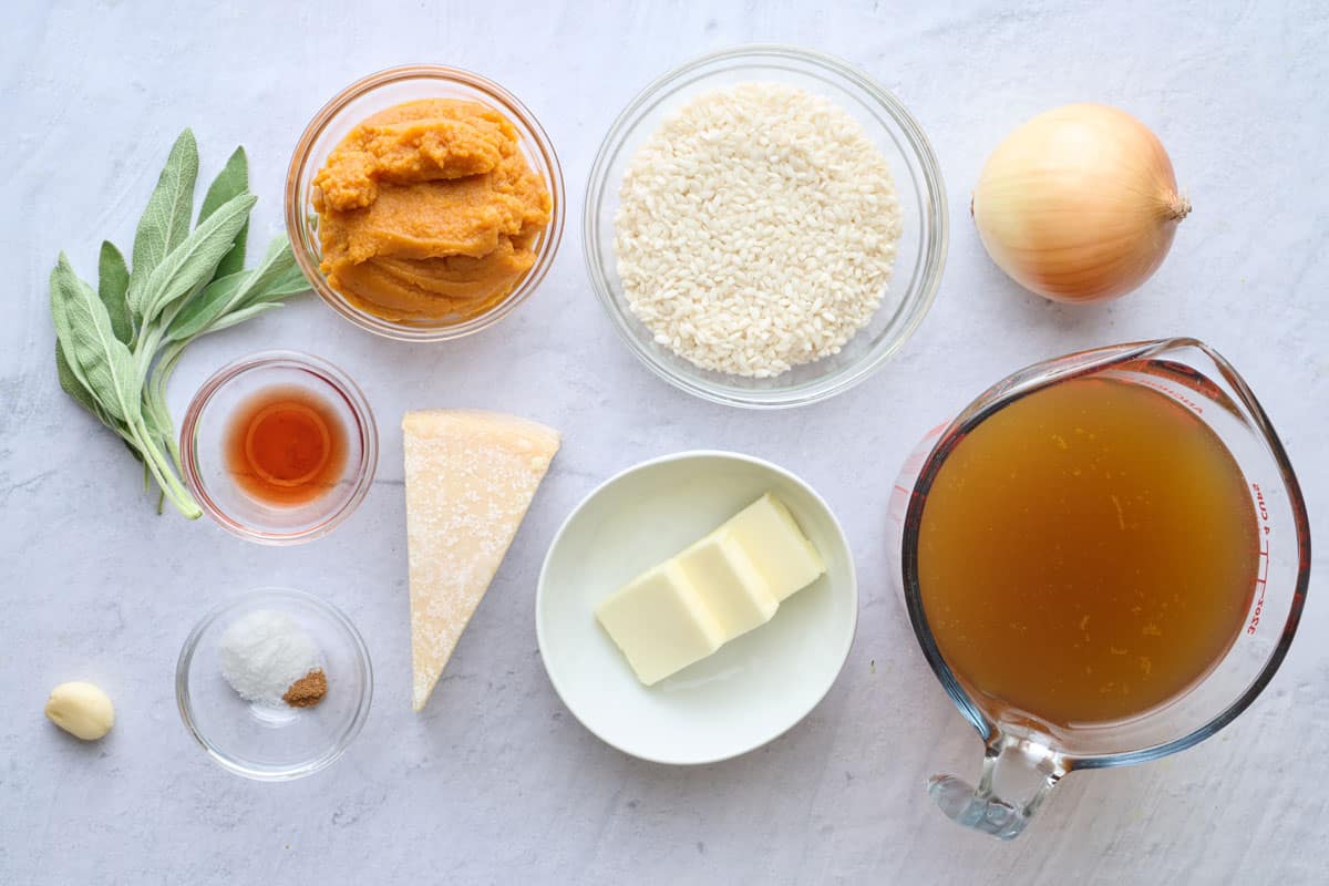 ingredients for recipe: fresh sage, garlic, salt and pepper, red wine vinegar, pumpkin puree, arborio rice, butter, broth and an onion.