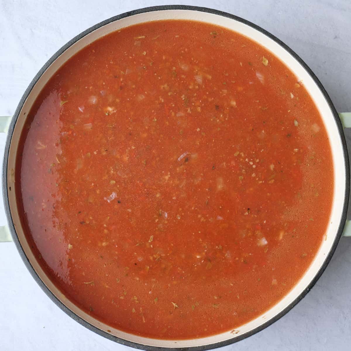 Beef and tomato broth soup recipe before adding the ravioli.