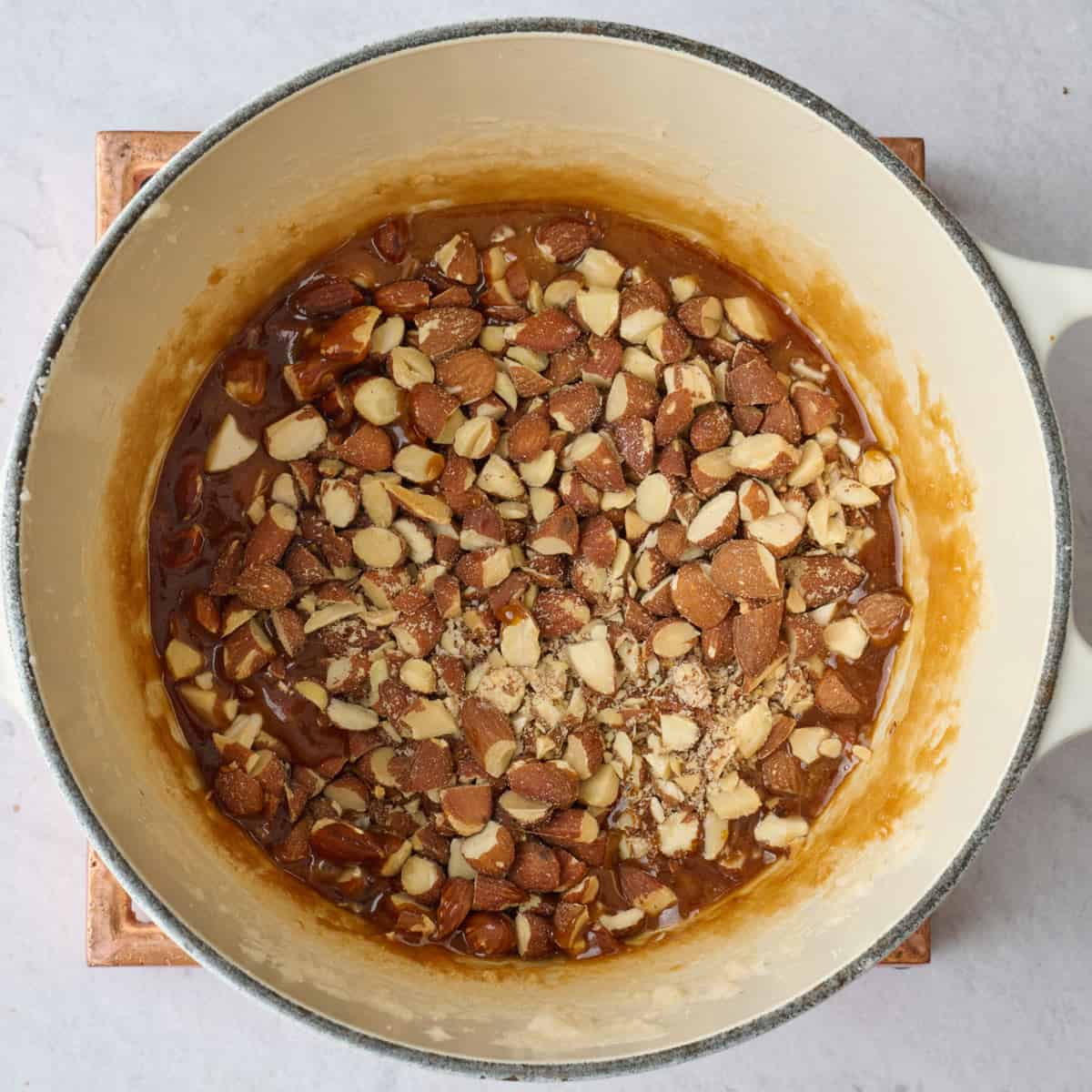 Chopped almonds added to caramel before combining.