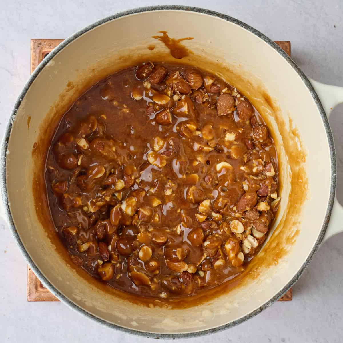 After tossing caramel and almonds together in a pot.