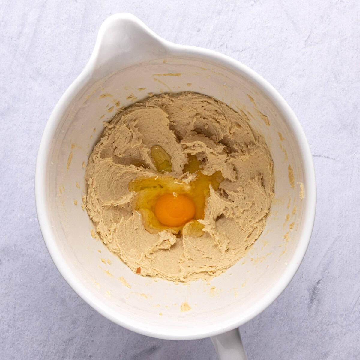 Creamed butter and sugar with an egg and almond extract added.