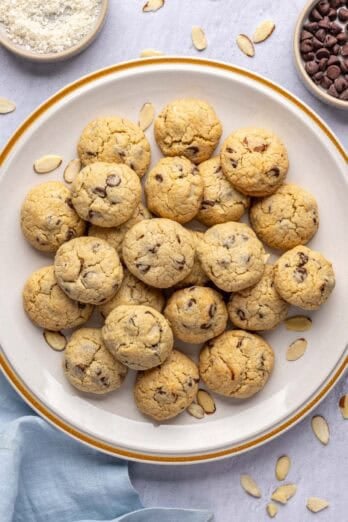 Best almond joy cookies made with shredded coconut, chocolate chips and sliced almonds on a large serving plate.