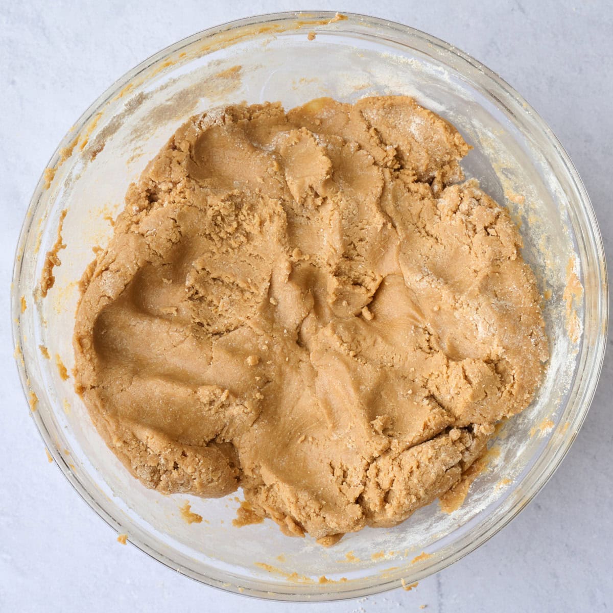 Maple sweetened peanut butter after combining with oat flour.