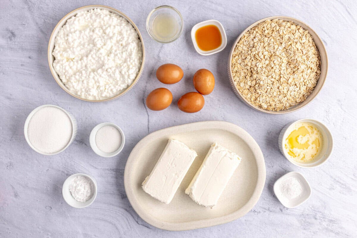 Ingredients for cottage cheese dessert recipe: cottage cheese, sugar, eggs, lemon juice, oats, melted butter, salt, cornstarch and cream cheese.