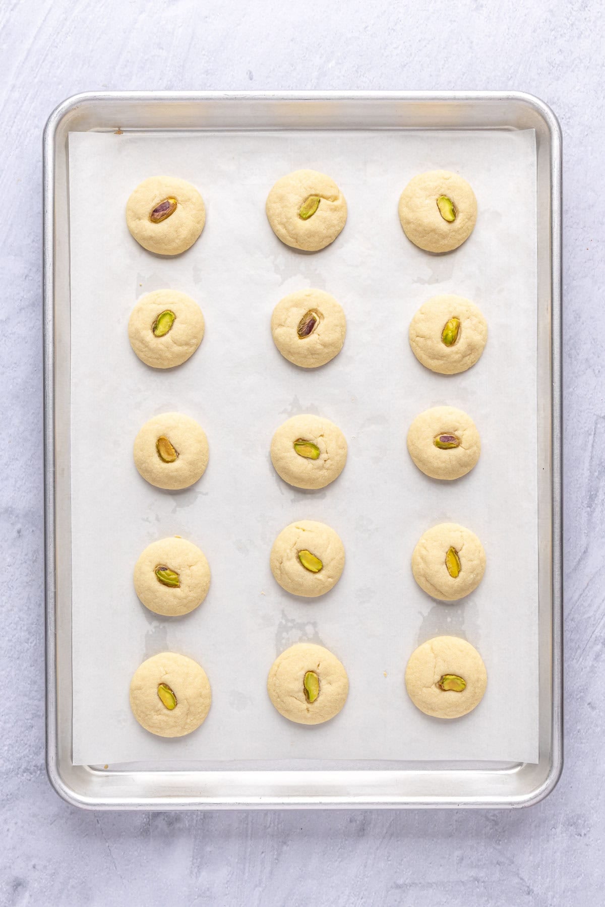 Ghraybeh cookie recipe after baking on cooking sheet.