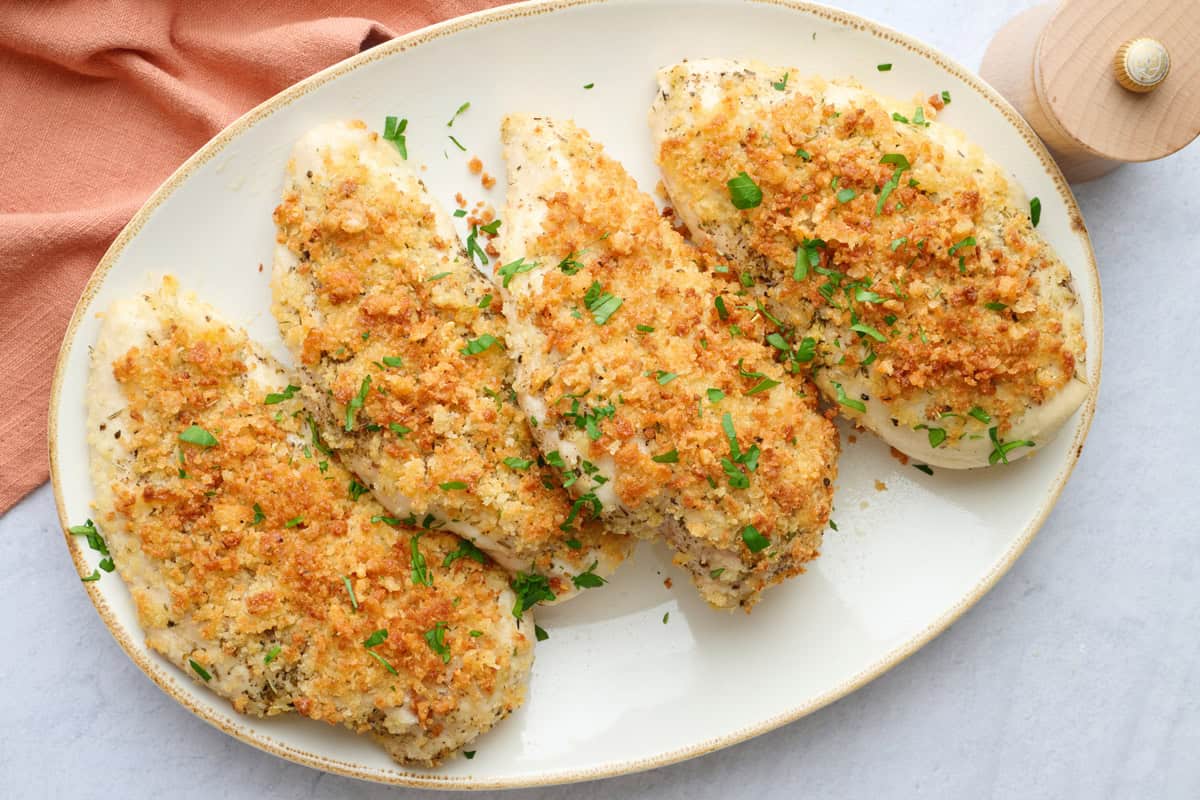 Easy garlic parmesan chicken breast recipe on a platter.