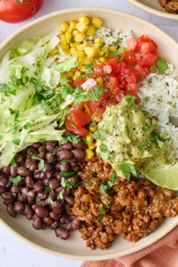 Ground beef burrito bowls with rice.