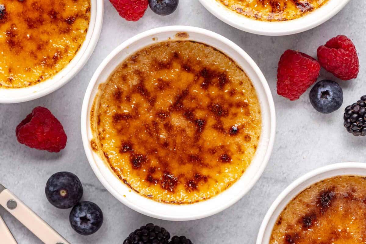 Classic creme brulee recipe in ramekins with crackly sugar top.