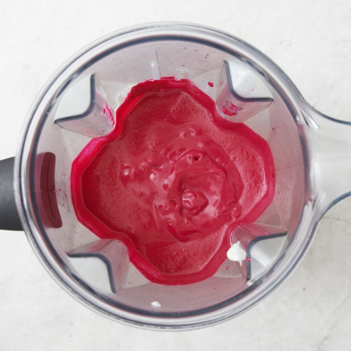 Pasta sauce after blending into a thick, creamy pink sauce.