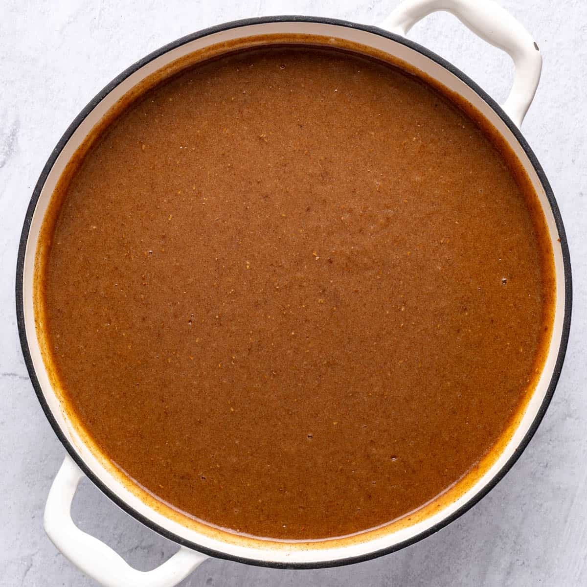 The mixture in a large pot after thickening into a pudding like consistency.