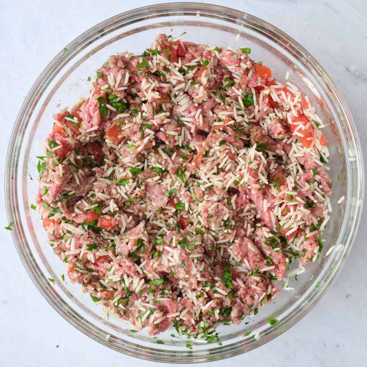 Ground beef and rice mixture after combining filling.