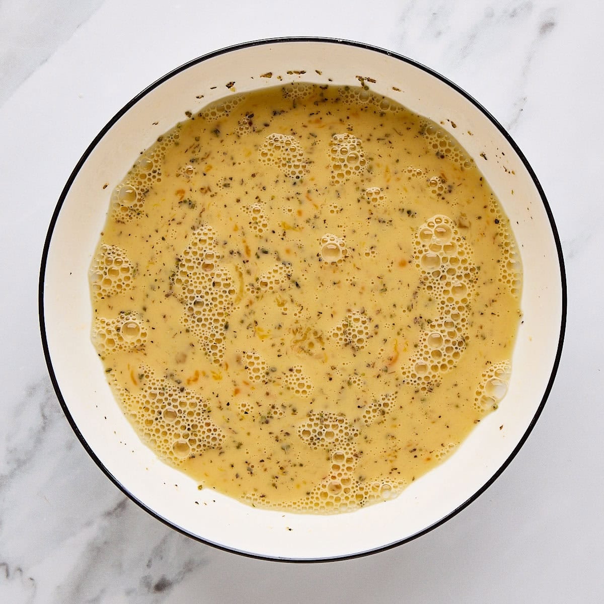 After whisking together eggs and seasonings.