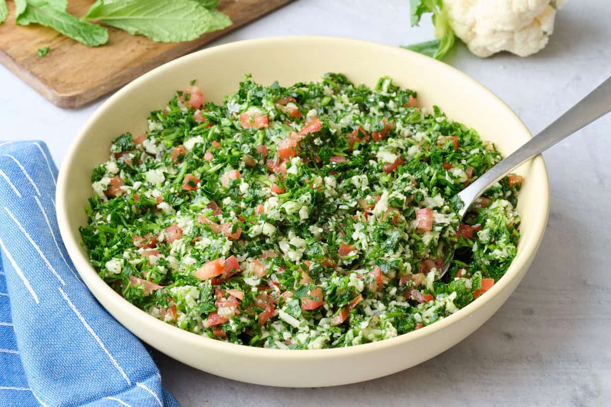 Tabbouleh salad recipe with no bulgur made with riced cauliflower.