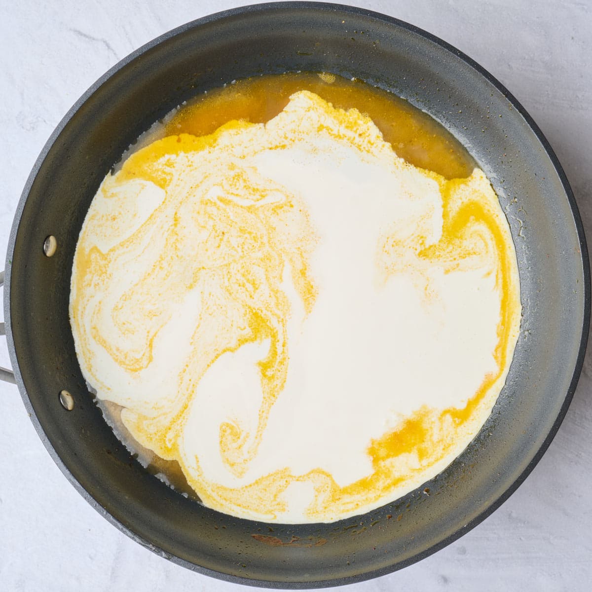 Cream added before stirring.