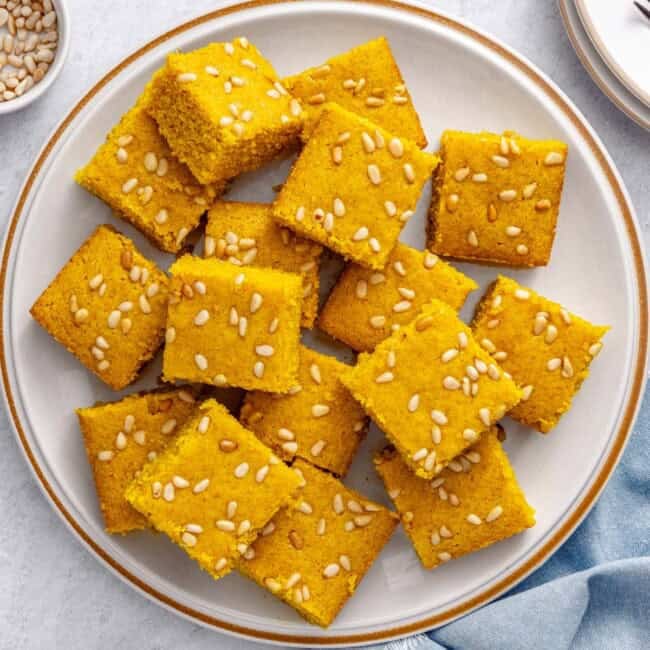 Easy turmeric cake recipe, or Lebanese sfouf recipe, on a plate.