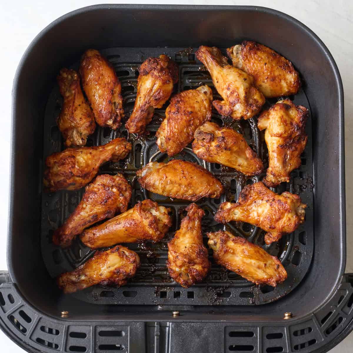 Crispy chicken wings after air frying.