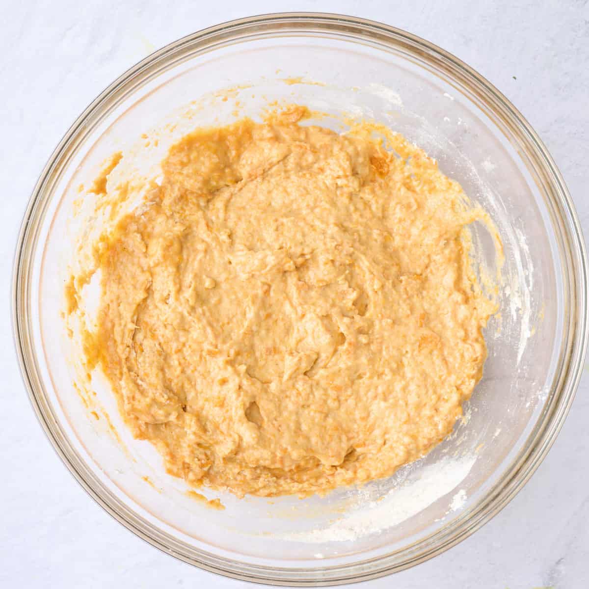 Sweet potato waffle batter in a bowl after combining.